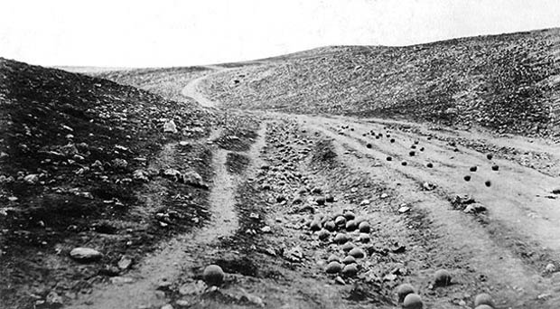 Fenton's second photograph, with cannonballs on the road